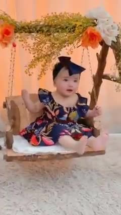 See how beautiful this baby looks while swinging in the cradle