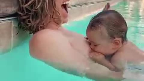 Baby tries to nurse dad