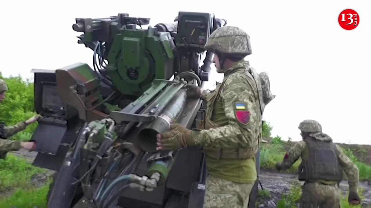 Ukrainian soldiers fire foreign-supplied artillery systems near eastern front line