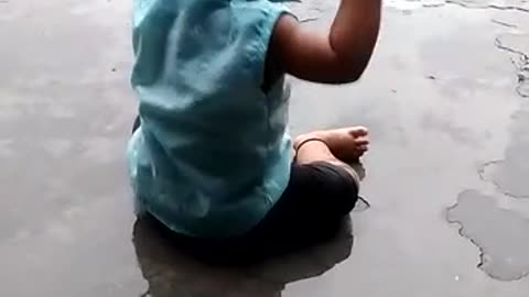 Little girl playing in Rain 😅🌧️🌧️