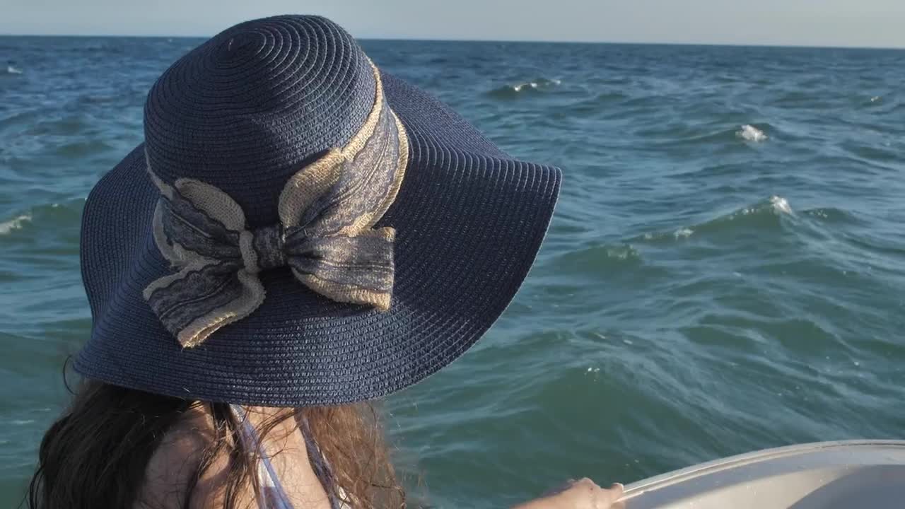 Woman boating on a clear day