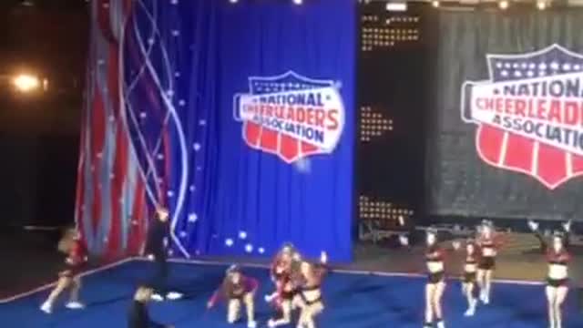 Cheer routine backflip collision