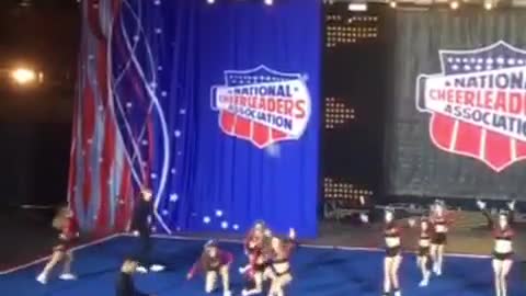 Cheer routine backflip collision