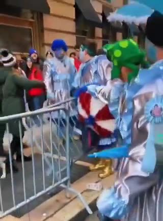 one assaulted during New Year's Parade in Philadelphia grabing a Trump flag from a Mummer