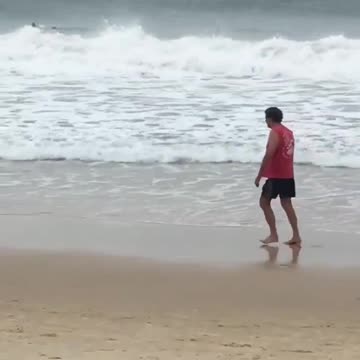 Kid with boogie board gets hit by wave "into the water"