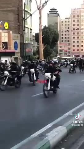 Iranian Police Thugs Fire on Protesters from Motorcycles in Tehran