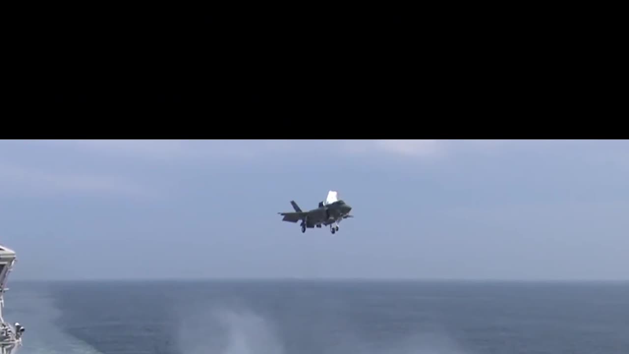 F35 fighter jet landing on aircraft carrier