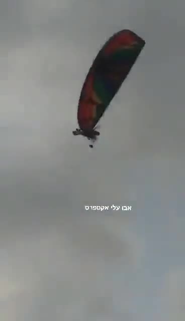 Stunning footage of Hamas infiltrator from Gaza using a motorized hang glider to fly into Israel