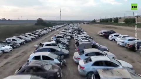 demolished cars Hamas attack on israel festival