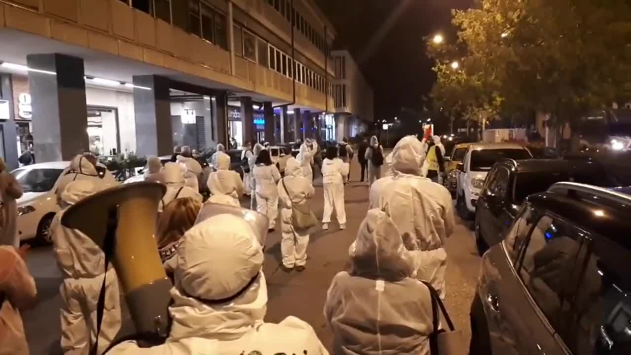 "Hands off the children" as anti Coronavirus passport protesters hit the streets of Padua, Italy