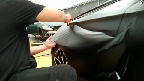 Watch This Pro Wrap Artist Turn a Car into a Mirror Finish Masterpiece!"