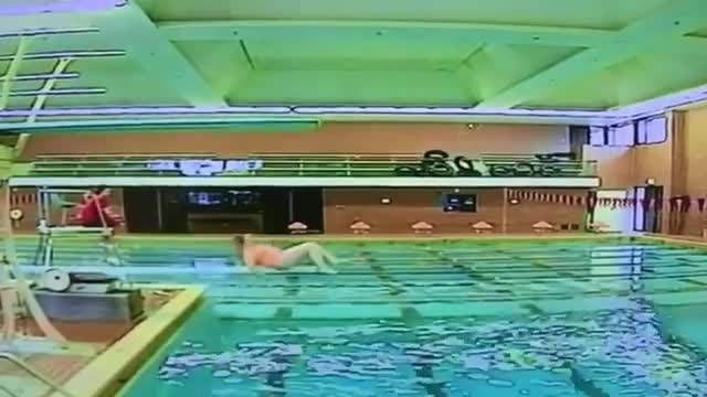 Pink swiumsuit diving board fall back