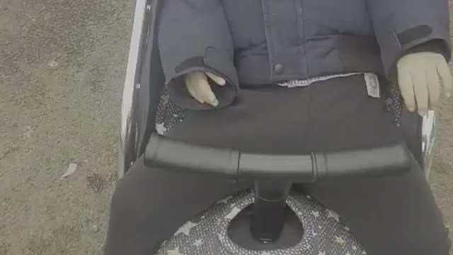 Asleep baby going to the children's house