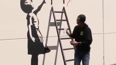 Fun with man doing graffiti