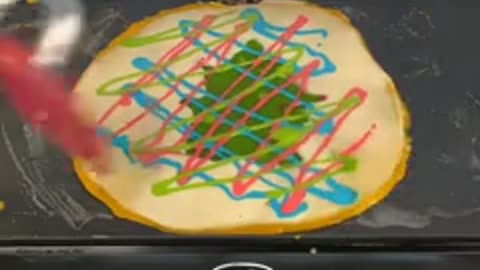 When he FLIPS it....INCREDIBLE pancake ART!