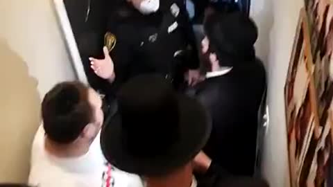 NYPD trying to stop a 10 person Jewish gathering.