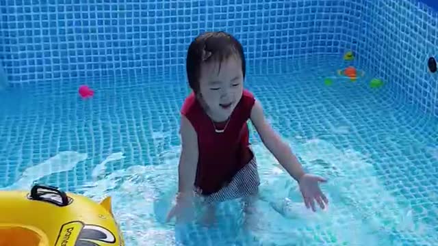 Baby in swimming pool