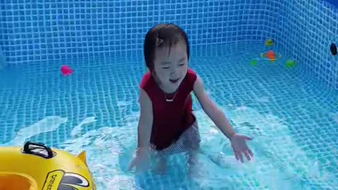 Baby in swimming pool