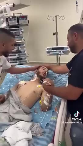 Hamas actor pretends to be a victim of an Israeli air strike