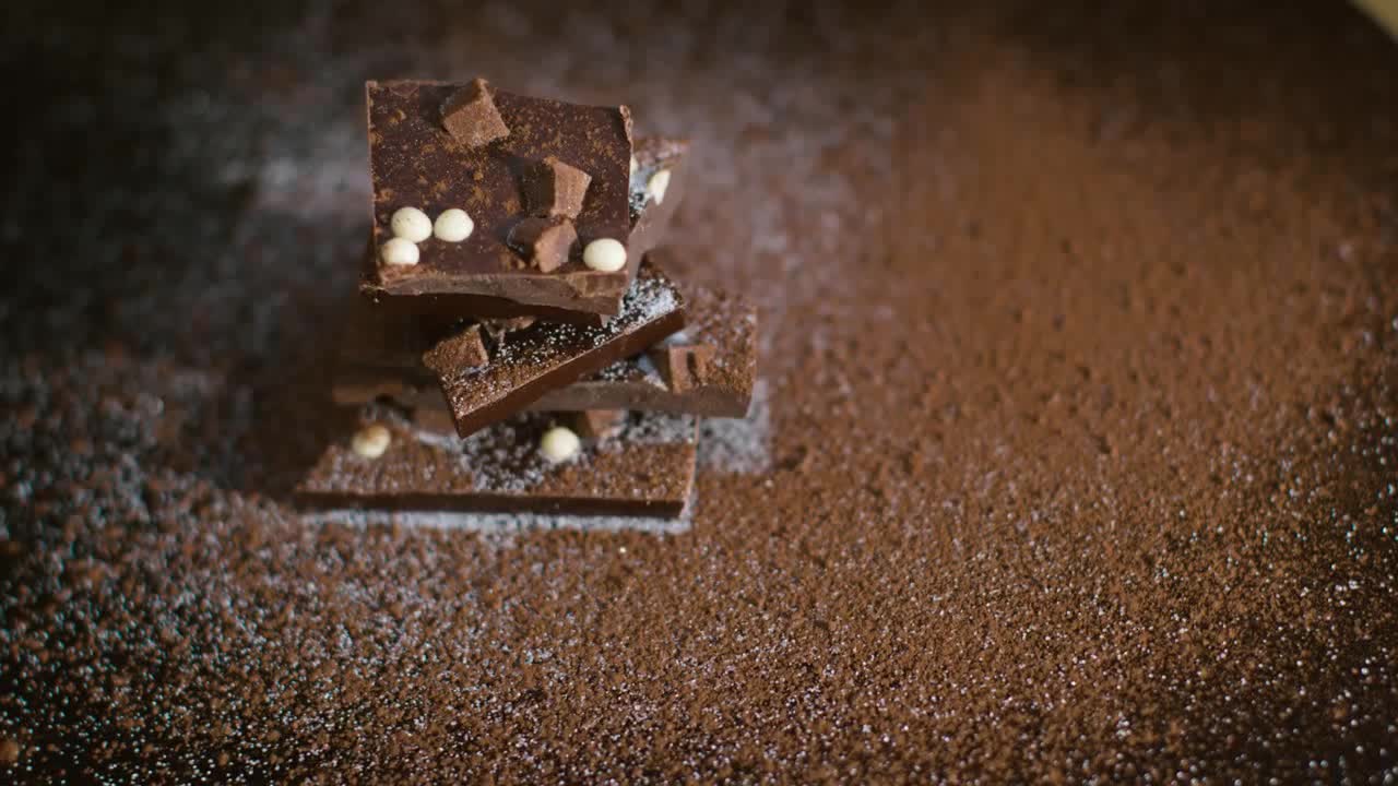 High Angle Shot of Rotating Chunks of Premium Looking Chocolate