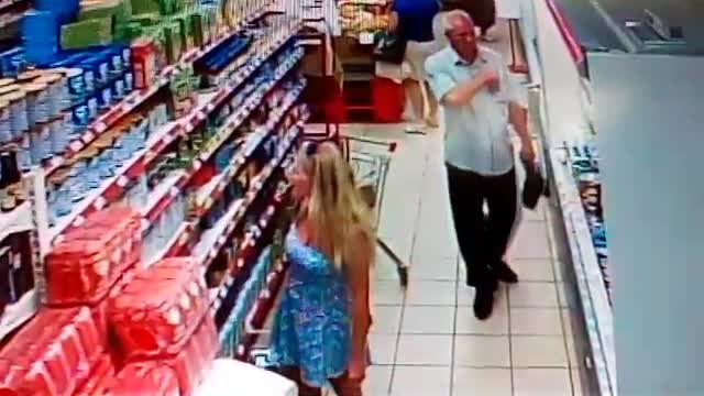 Perverted Shopper Snaps Picture Under Woman's Dress