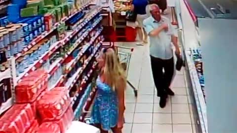 Perverted Shopper Snaps Picture Under Woman's Dress