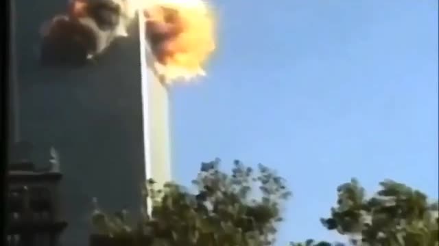 9/11 Plane wing disappears behind tower ... THATS IMPOSSIBLE! CGI Proof Right There!