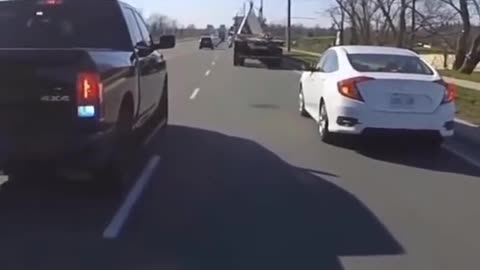 Care passes biker in same lane,then gets pulled over!