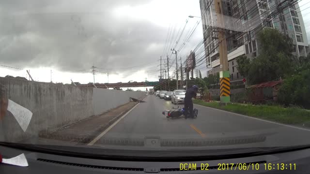 Flying Billboard Hits Man on Moped