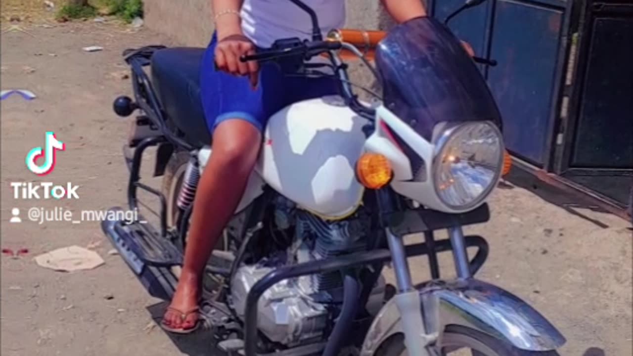 Beautiful girl riding a motorbike 🏍