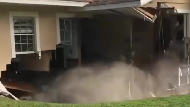 House Breaks Up And Falls Into Sink Hole