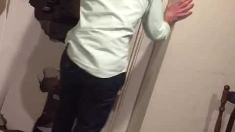 Guy pastel shirt running into wall with helmet