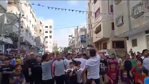 Gazans respond to the Israeli Forces chanting: "Death before dishonor."