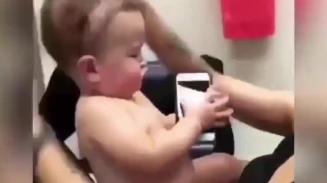 dad braiding baby's hair