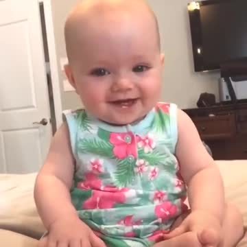 Cute baby on the bed