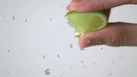 Squeezing Slice of Lime Super Slow Motion🍋