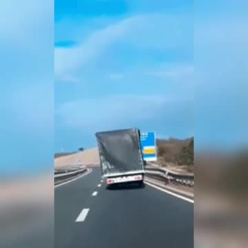 Crazy wind almost tips truck over