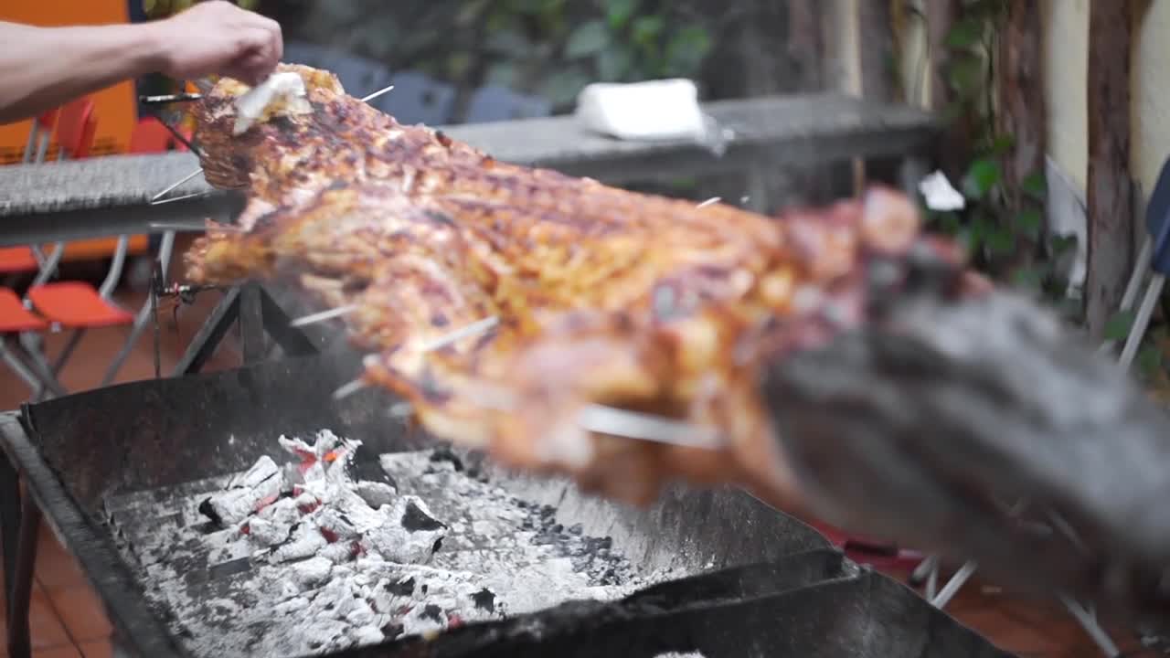 Grilled crocodile on the open fire at sea food restaurant, exotic meals in Viethnam