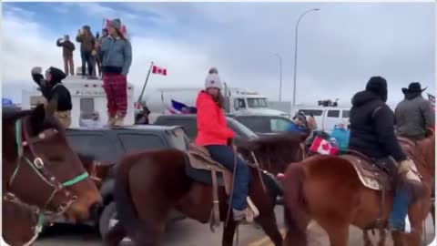 Supporters of the truckers convoy joining the protest on horseback in Ottawa