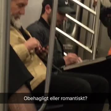 Guy drawing girl on subway