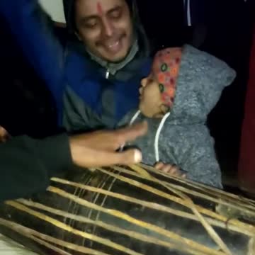 Baby playing with musical instruments