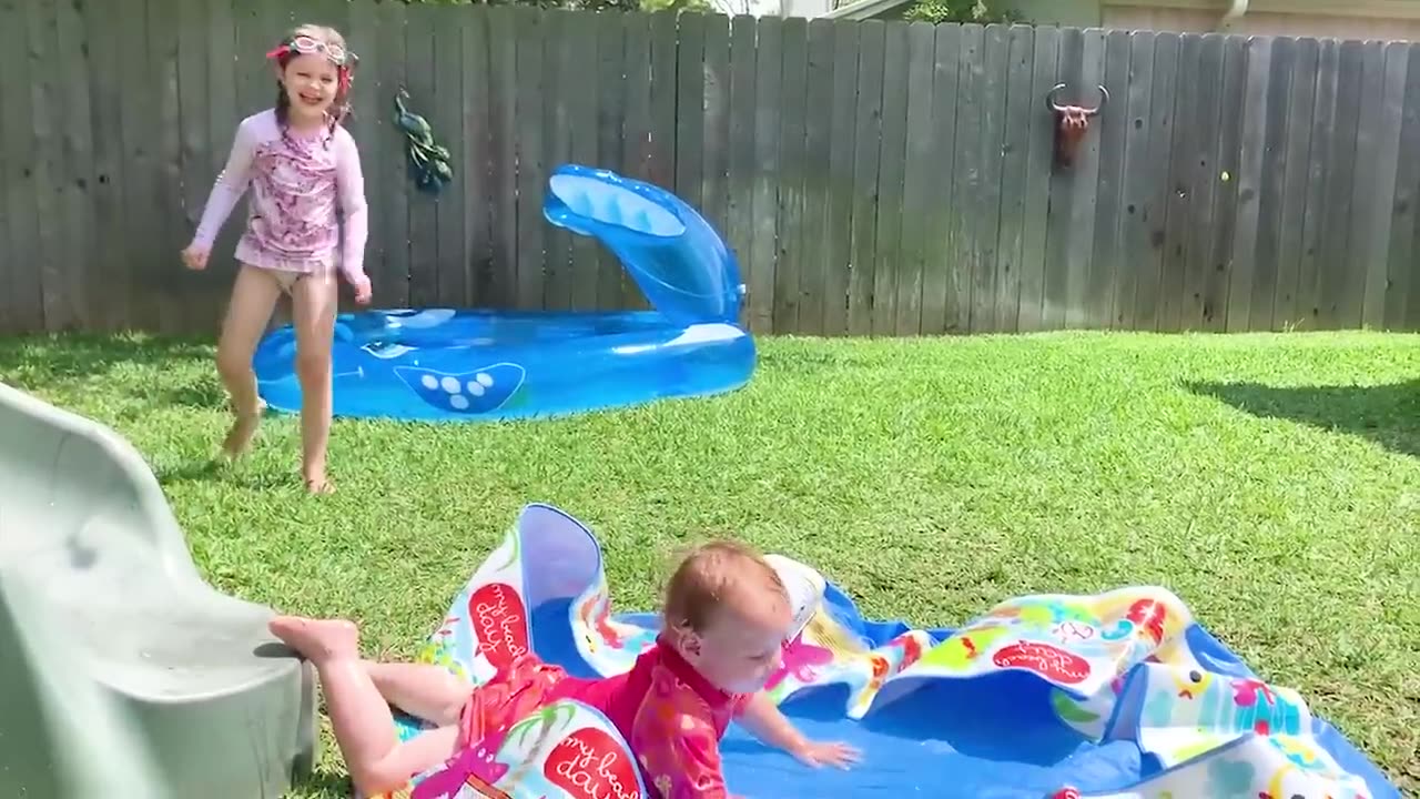 Funny and cute Babis playing slide