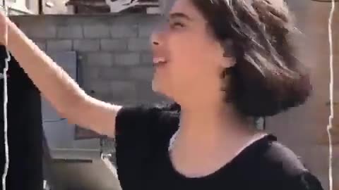 Young Muslim girl screams “Allah is with us” as her people butcher civilians