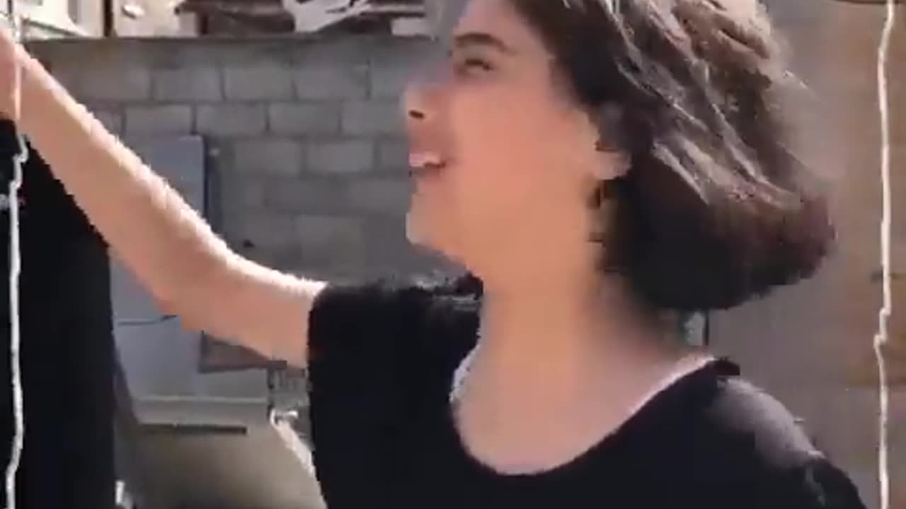 Young Muslim girl screams “Allah is with us” as her people butcher civilians