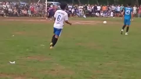 Football match between villages in a region in Indonesia