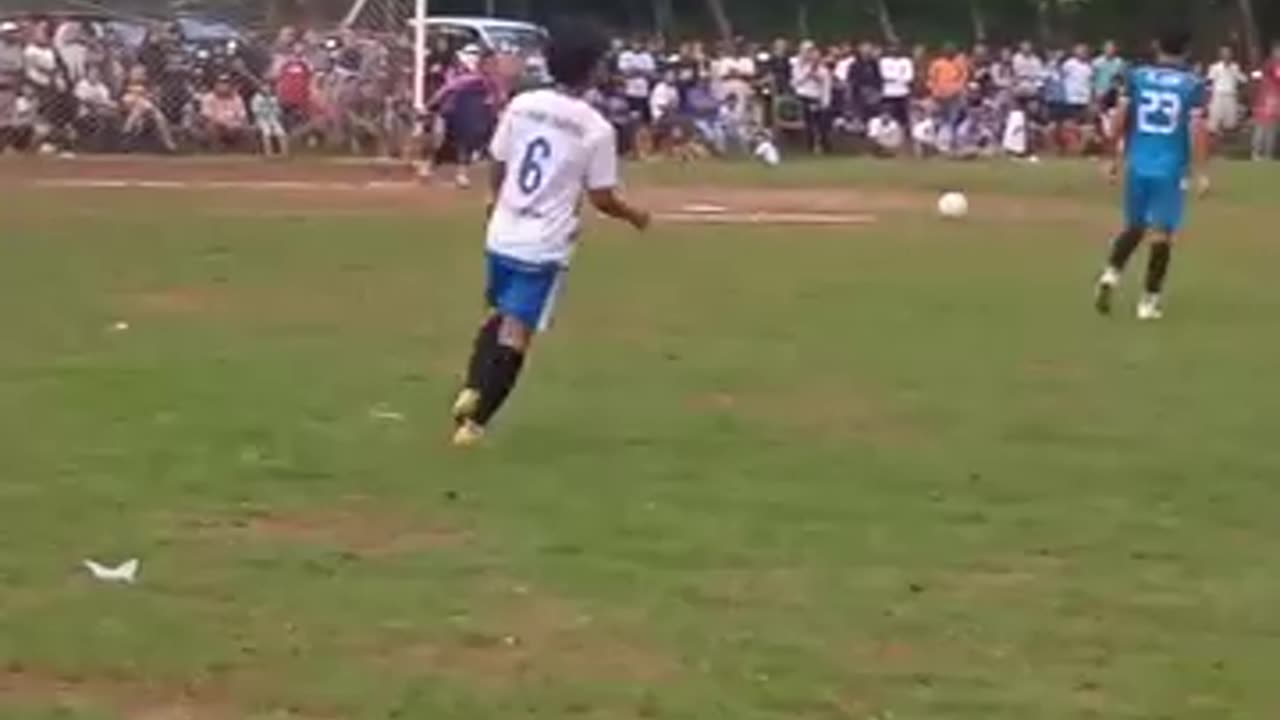 Football match between villages in a region in Indonesia