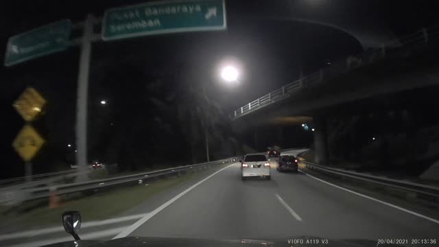 Overtaking Car Slams Into Barrier