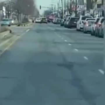 100’s of cars line the streets of Chicago as gas stations hold a “Free Gas Giveaway”.