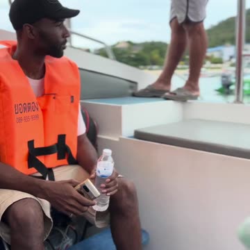 He jumps off the boat! into the ocean!