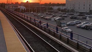 LIRR ends run in Hicksville with sunset in background